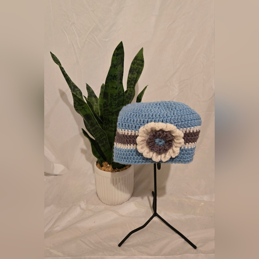 Blue and White Crochet Hat with Flower Accent